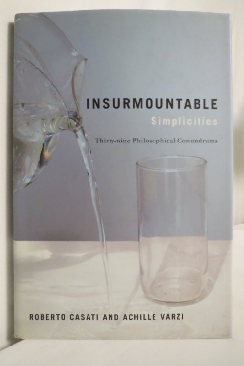INSURMOUNTABLE SIMPLICITIES; Thirty-Nine Philosophical Conundrums (DJ protected by a brand new, clear, acid-free mylar cover)