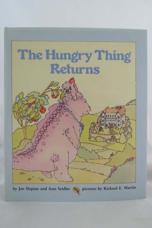 THE HUNGRY THING RETURNS; (DJ protected by a brand new, clear, acid-free mylar cover)