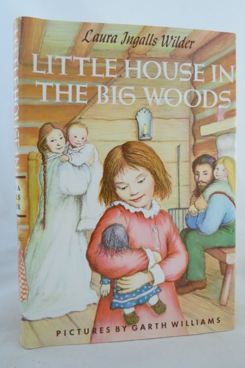 LITTLE HOUSE IN THE BIG WOODS; (DJ protected by a brand new, clear, acid-free mylar cover)