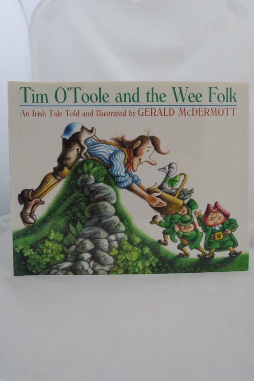 TIM O'TOOLE AND THE WEE FOLK; (DJ protected by a brand new, clear, acid-free mylar cover) (Signed by Author)