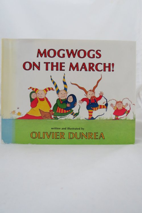 MOGWOGS ON THE MARCH! ; (DJ is protected by a clear, acid-free mylar cover) (Signed by Author)