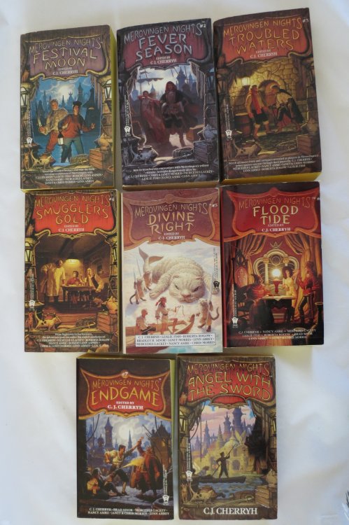 Image for MEROVINGEN NIGHTS (COMPLETE 8 VOLUME SET) Angel with the Sword; Festival Moon #1; Fever Season #2; Troubled Waters #3; Smuggler's Gold #4; Divine Right #5; Flood Tide #6; Endgame #7 (Signed by Author) MEROVINGEN NIGHTS (COMPLETE 8 VOLUME SET) Angel with the Sword; Festival Moon #1; Fever Season #2; Troubled Waters #3; Smuggler's Gold #4; Divine Right #5; Flood Tide #6; Endgame #7 (Signed by Author)
