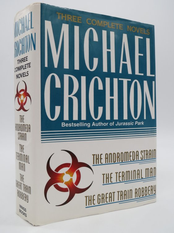 THREE COMPLETE NOVELS; The Andromeda Strain, the Terminal Man, and the Great Train Robbery (DJ Protected by a Brand New, Clear, Acid-Free Mylar Cover)