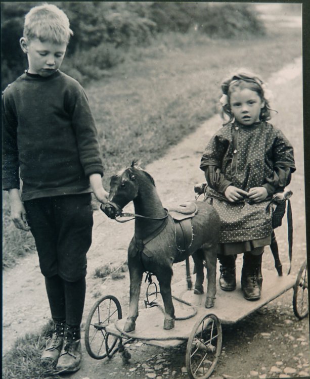 Boy and Girl and a Toy Cart