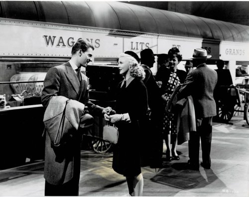 Image for A VINTAGE CONTINUITY LAYOUT PHOTOGRAPH depicting GINGER ROGERS and JEAN-PIERRE AUMONT at the train station in a scene from A VINTAGE CONTINUITY LAYOUT PHOTOGRAPH depicting GINGER ROGERS and JEAN-PIERRE AUMONT at the train station in a scene from