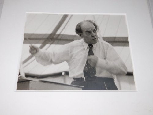 Image for A WONDERFUL ORIGINAL PHOTOGRAPH OF THE GREAT BRAZILIAN CLASSICAL COMPOSER VILLA-LOBOS, HIS BATON A BLUR, AS HE CONDUCTS FROM A CRUDE PODIUM UNDER A TENT. A WONDERFUL ORIGINAL PHOTOGRAPH OF THE GREAT BRAZILIAN CLASSICAL COMPOSER VILLA-LOBOS, HIS BATON A BLUR, AS HE CONDUCTS FROM A CRUDE PODIUM UNDER A TENT.