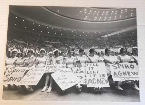 Image for ORIGINAL WHITE HOUSE PHOTOGRAPH of the audience of 10,000 gathered to support Vice President SPIRO T. AGNEW in Memphis, with nurses seated in the first several rows. ORIGINAL WHITE HOUSE PHOTOGRAPH of the audience of 10,000 gathered to support Vice President SPIRO T. AGNEW in Memphis, with nurses seated in the first several rows.