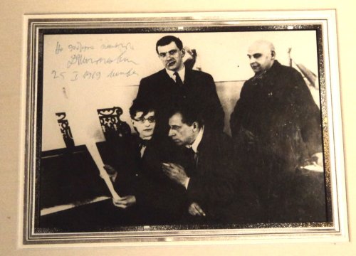 A SIGNIFICANT PHOTOGRAPH INSCRIBED & SIGNED BY DMITRI SHOSTAKOVICH. A most famous photograph of this important gathering of Russian artists, each of whom contributed to the play 