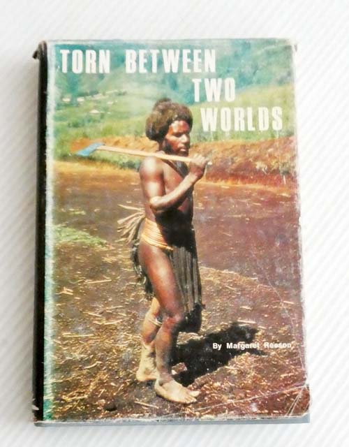 Image for Torn Between Two Worlds. Torn Between Two Worlds.