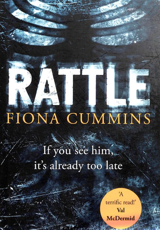 Rattle. First Edition