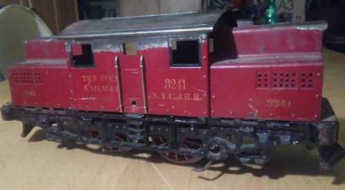 Electric Train engine Circa 1921-1922 - red above, with early frame with no simulated 3rd rail pickup, red painted steps and early motor-