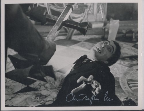 DRACULA. Christopher Lee, signed studio photo, as Dracula, in HORROR OF DRACULA. With an original lobby card HORROR OF DRACULA. Universal Pictures, 1958.