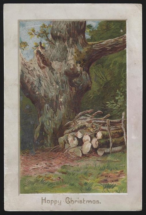HAPPY CHRISTMAS CARD WITH LANDSCAPE TREE AND CUT LOGS
