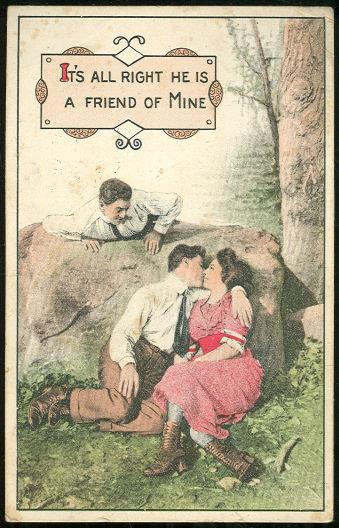 KISSING COUPLE WITH FRIEND LOOKING ON