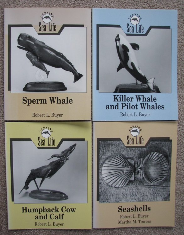 Four volumes of the Carving Sea Life series: Sperm Whale; Killer Whales and Pilot Whales; Humpback Cow and Calf; and Seashells